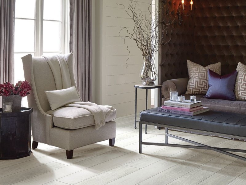 living room with hard flooring and couches - Todd's Tile Co.